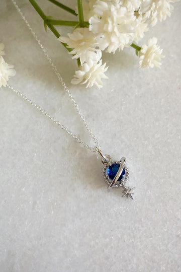Orion Navy Silver Planet and Star Necklace Wisteria London
